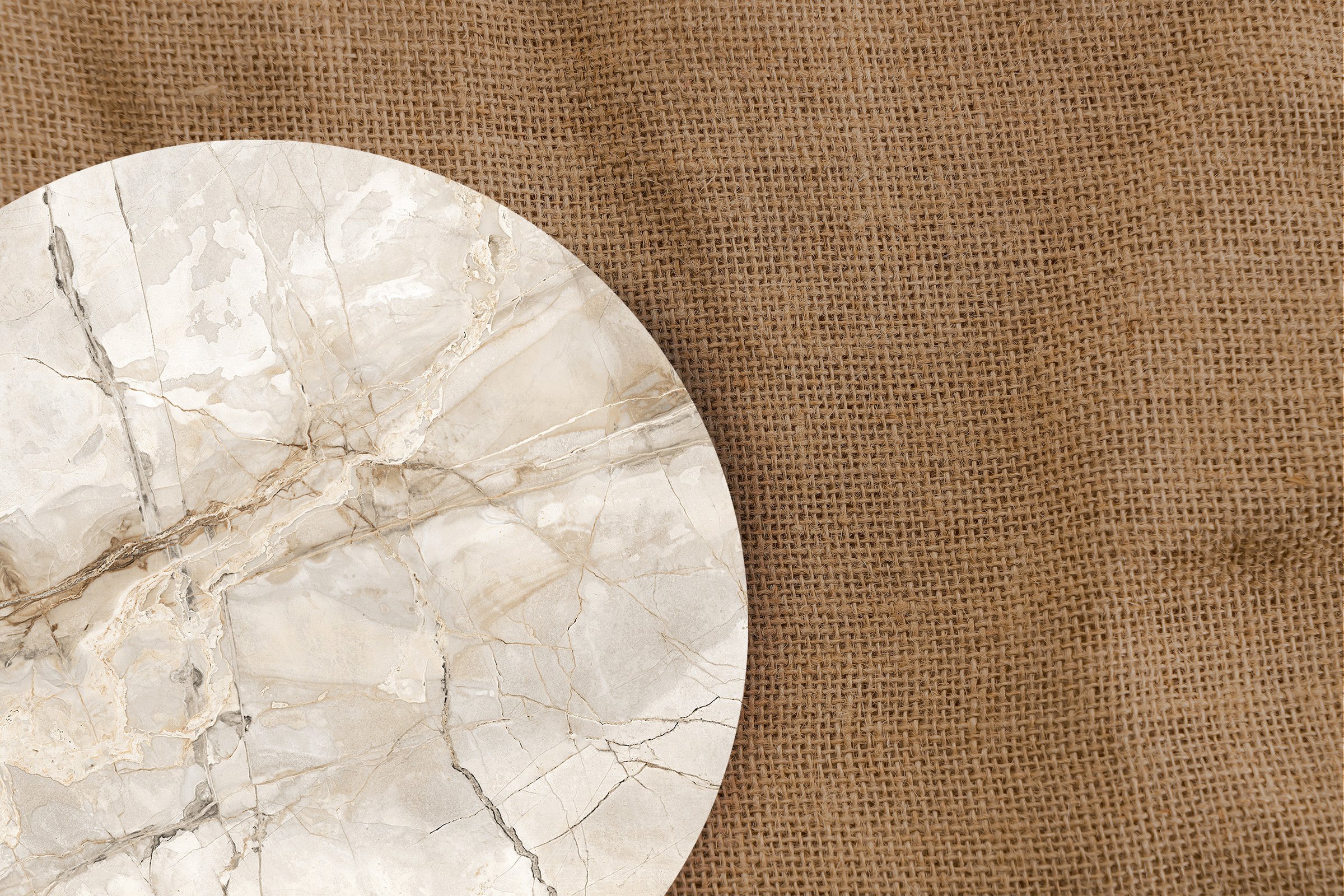 Round Marble Surface on Cloth Texture Background